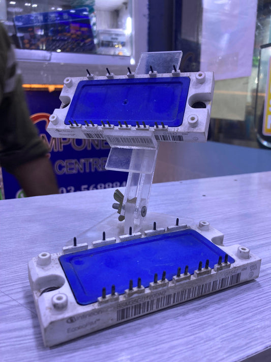 BSM35GD120DN2 power module with multiple pins displayed on a stand at The Component Centre