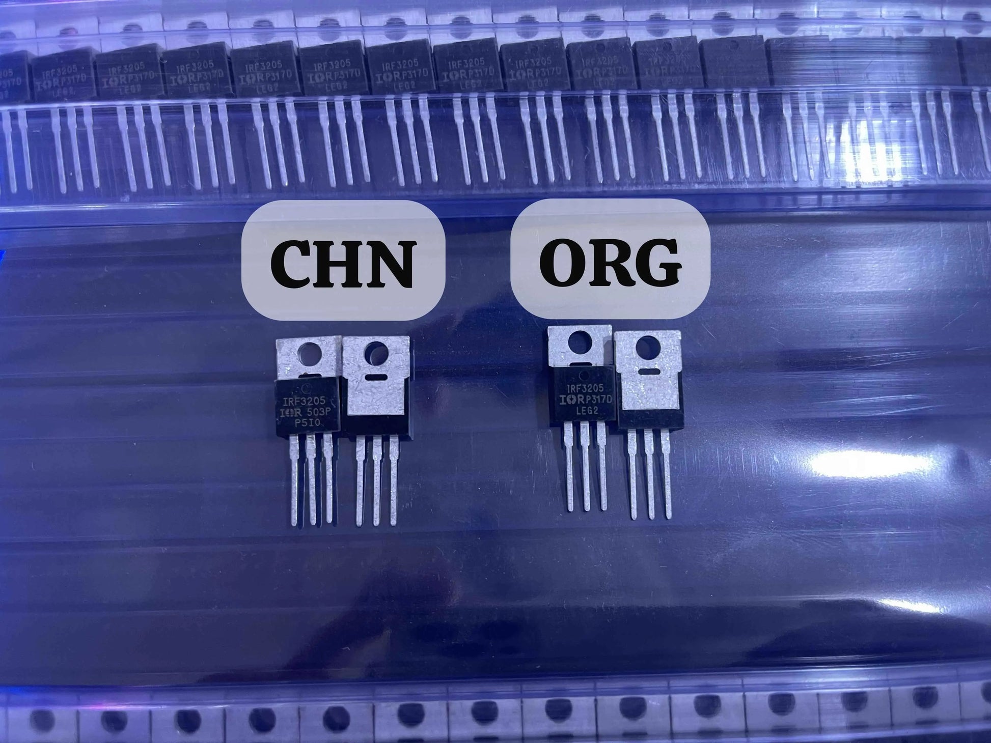 IRF3205 power MOSFET transistors from The Component Centre with metal tab and three pins side by side