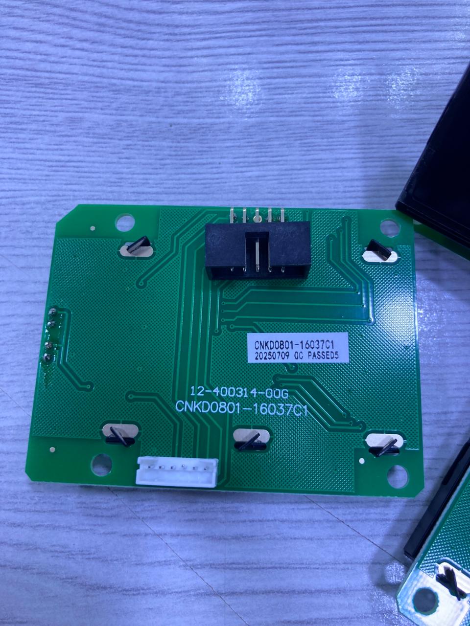 JDA0801-16037C1 LCD green PCB module with connector and four mounting holes from The Component Centre