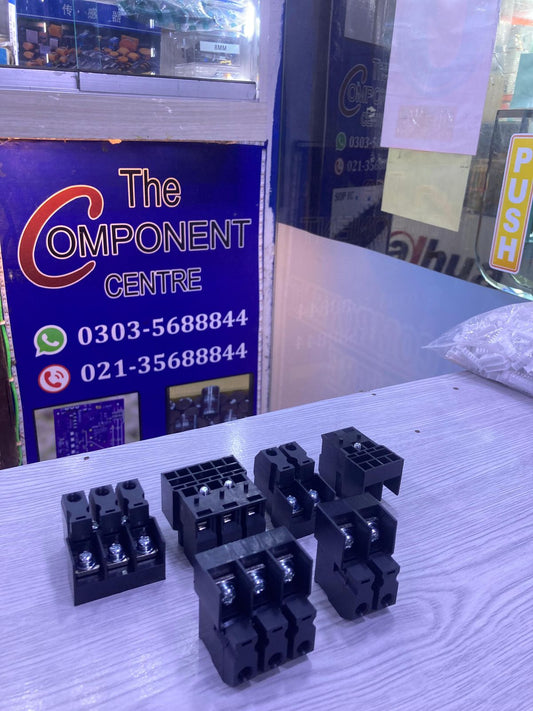 Black plastic terminal connector blocks displayed on counter at The Component Centre 2-pin 3-pin block for wiring