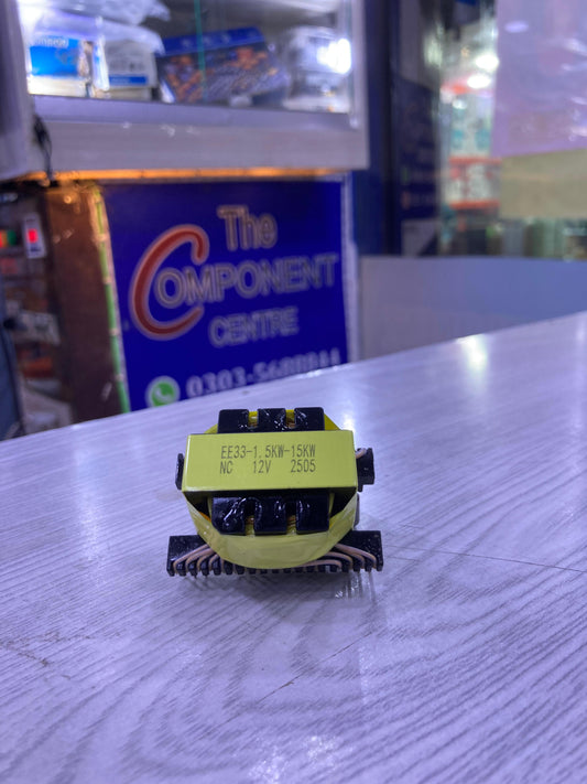 EE33-1.5-15KW electronic component transformer with yellow label on white surface from The Component Centre