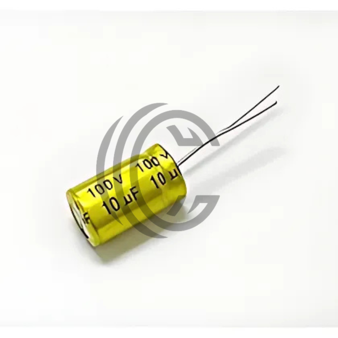 Yellow electrolytic capacitor labeled 10uF 100V with two wire leads from The Component Centre