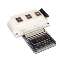 FF200R12KT4 Power Module on a Scale Showing Weight for Electronic Component Applications