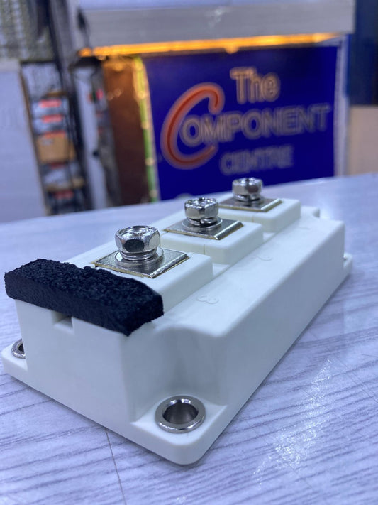 BSM200GB170DLC white three terminal power module with metal studs and foam spacer on table at The Component Centre