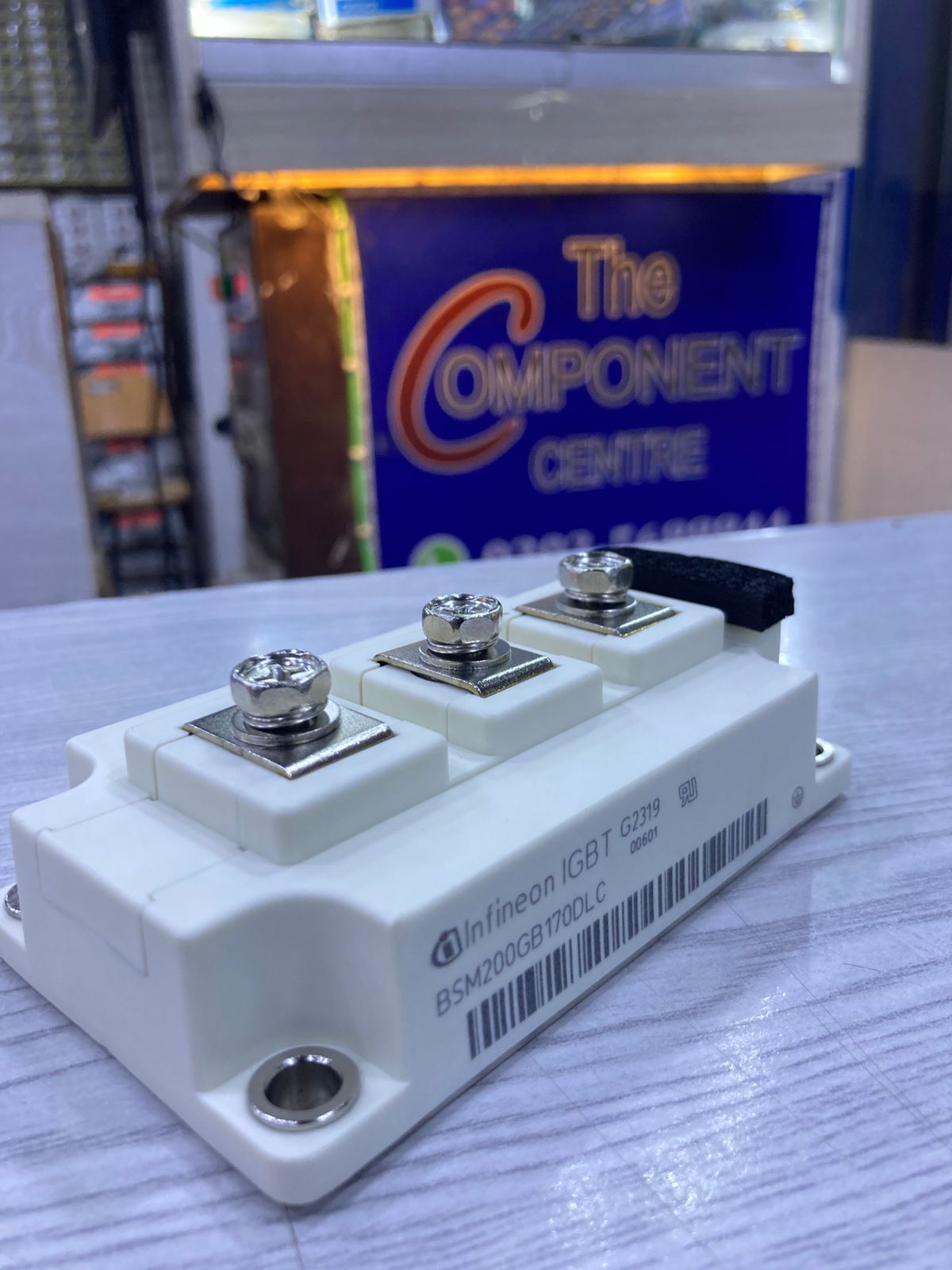 Infineon IGBT module BSM200GB170DLC on display at The Component Centre white three terminal power module