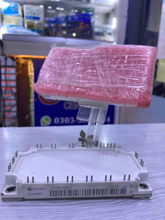 Infineon FP75R12KE3 power module from The Component Centre wrapped in protective pink plastic