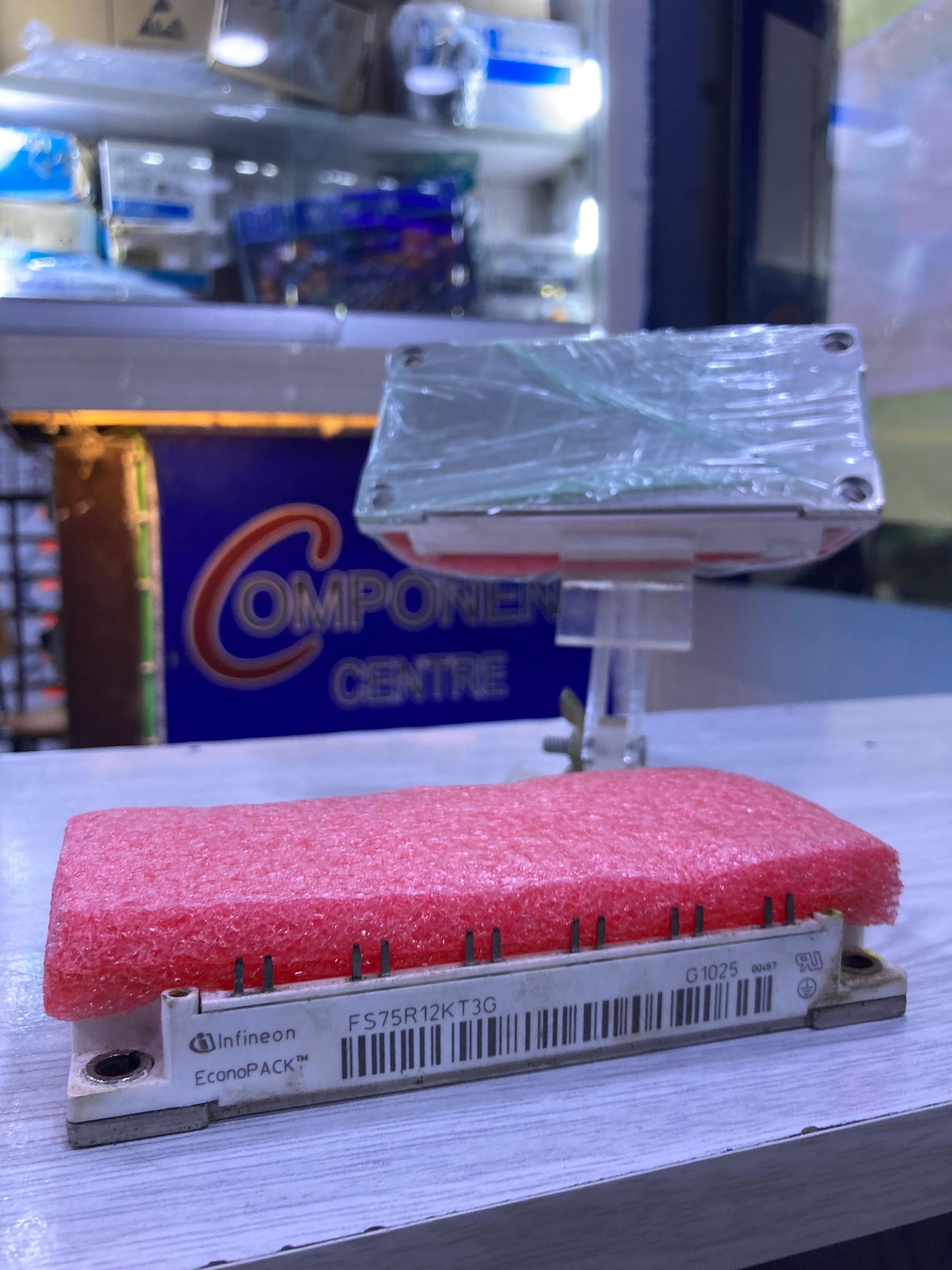 Infineon FS75R12KT3G power module with protective pink foam packaging displayed at The Component Centre