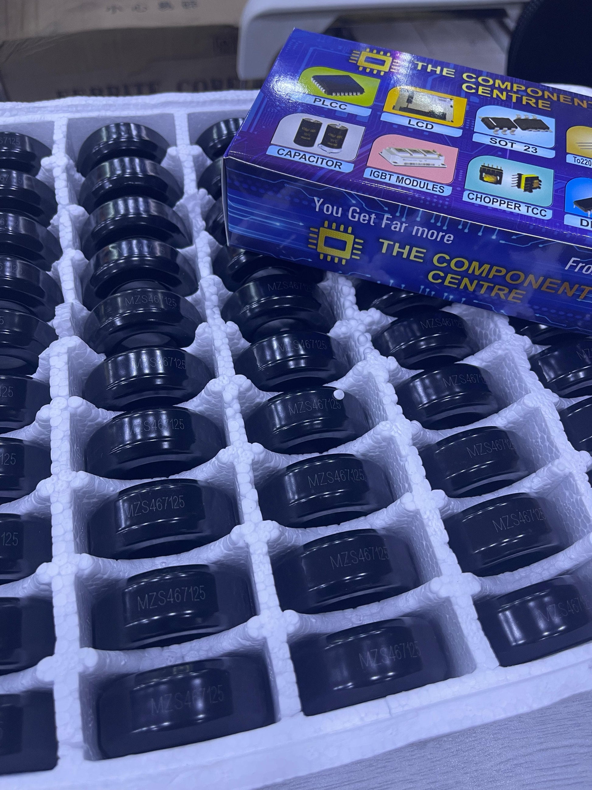 Multiple 2 Inch Ferrite Core components neatly arranged in foam packaging from The Component Centre