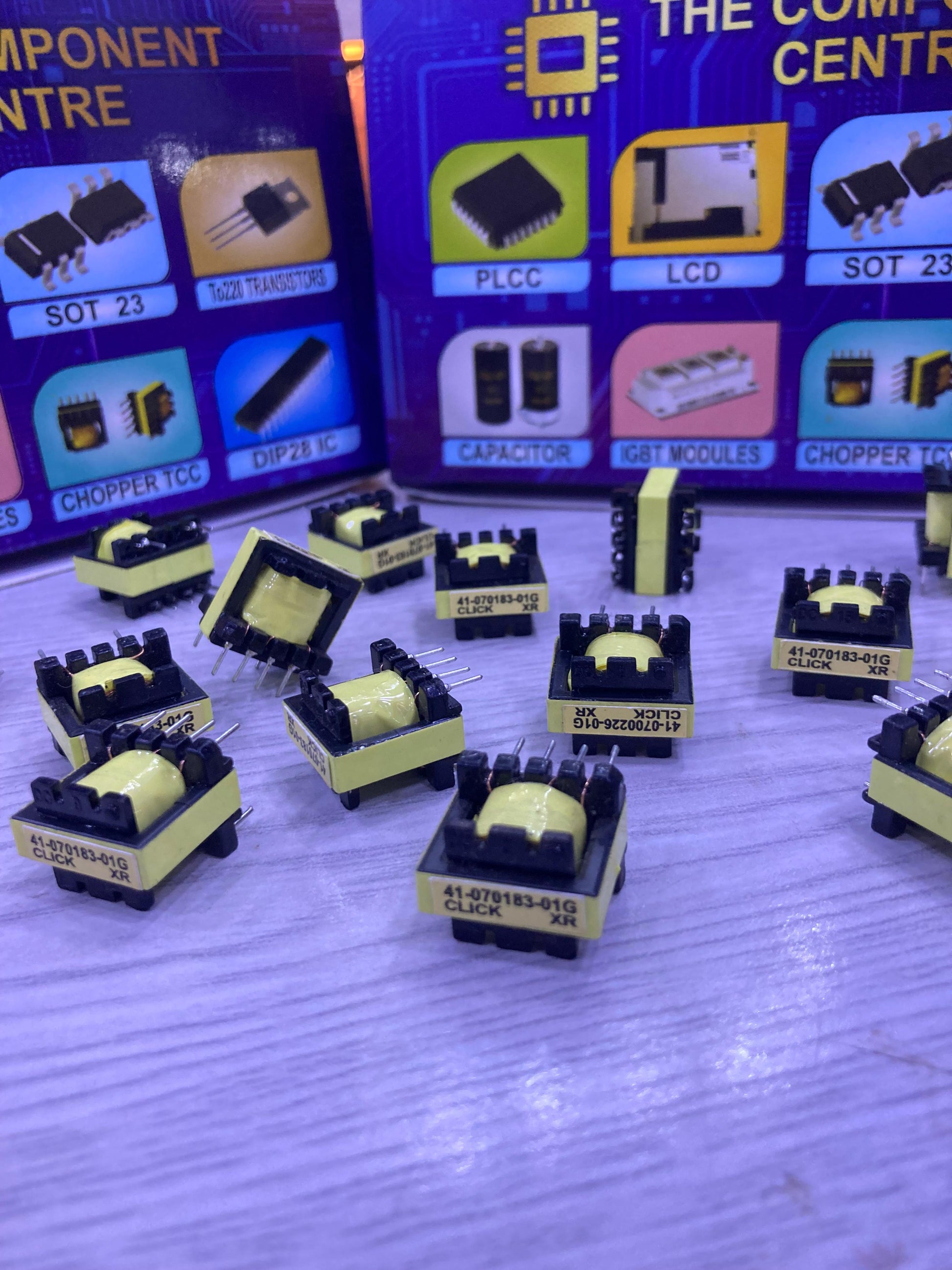 TX 41-070183-01G electronic transformers displayed on a table with The Component Centre packaging in the background